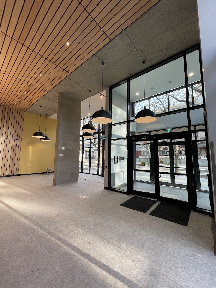 Architectural slat-ceiling lighting installed by Call Paul Contracting in a commercial Edmonton lobby